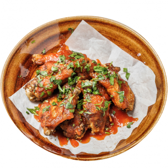 Курячі крильця у томатному соусі